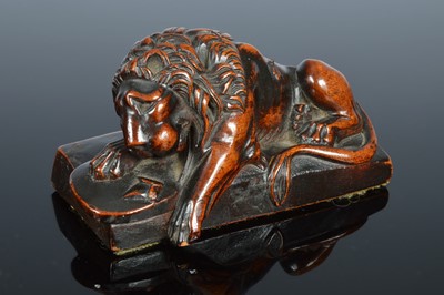 Lot 363 - A small 19th century carved figure of a lion