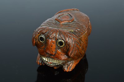 Lot 366 - A 19th century carved coquilla nut snuff box