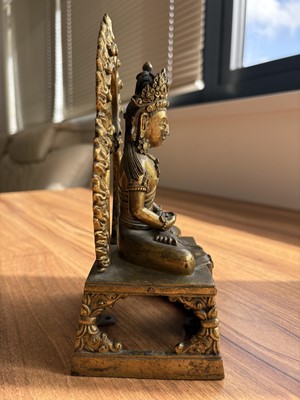 Lot 373 - A pair of antique Far Eastern gilt bronnze Buddhist figures