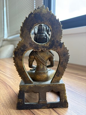 Lot 373 - A pair of antique Far Eastern gilt bronnze Buddhist figures