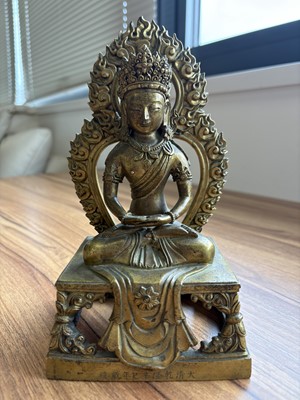 Lot 373 - A pair of antique Far Eastern gilt bronnze Buddhist figures