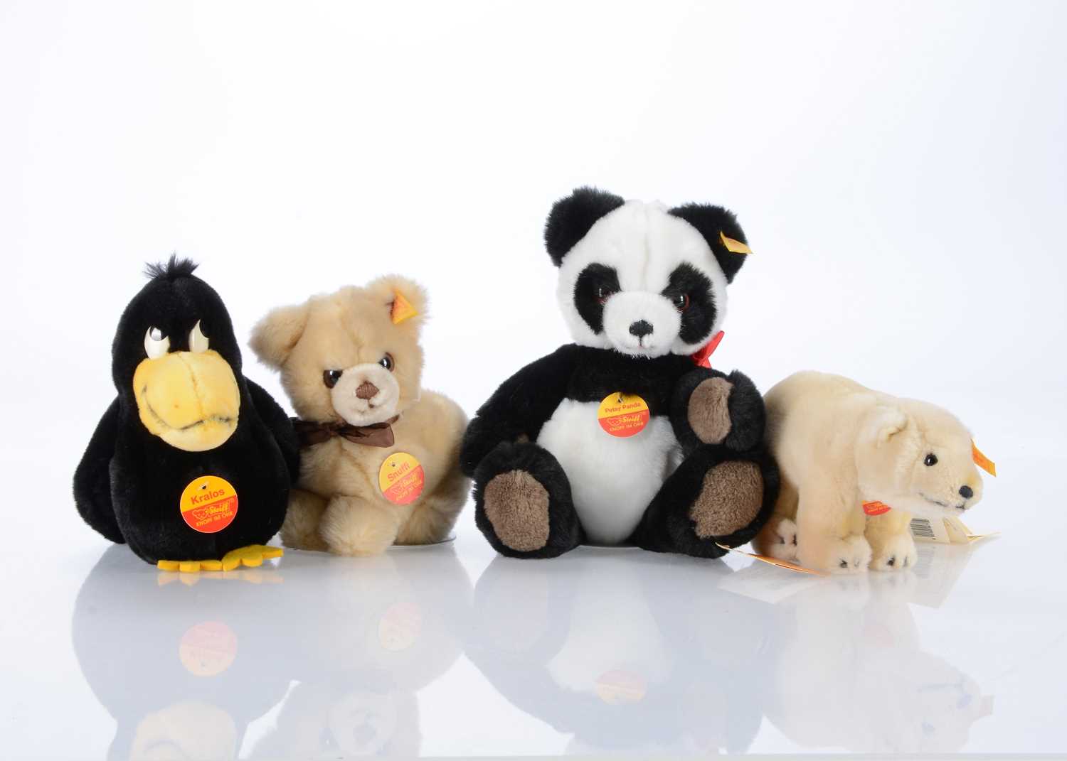 Lot 49 - Four Steiff yellow tag teddy bears and soft toy animals
