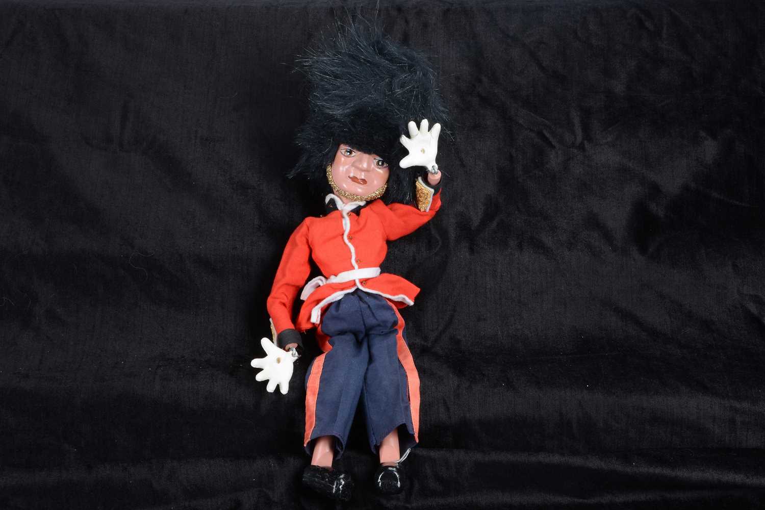 Lot 112 - A 1980s Pelham Puppets SL De Luxe  Range Guardsman 