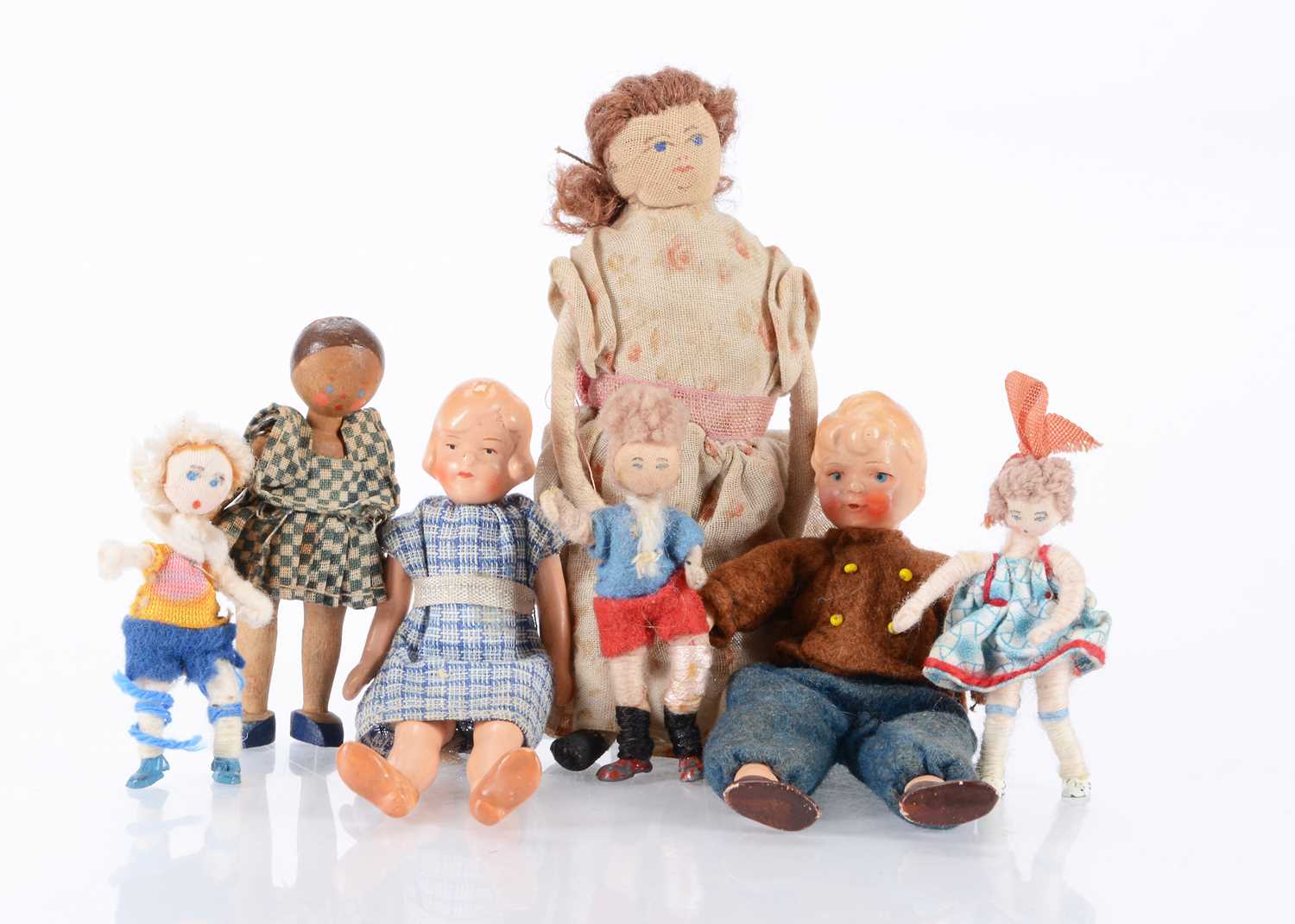 Lot 153 - Seven dolls’ house dolls
