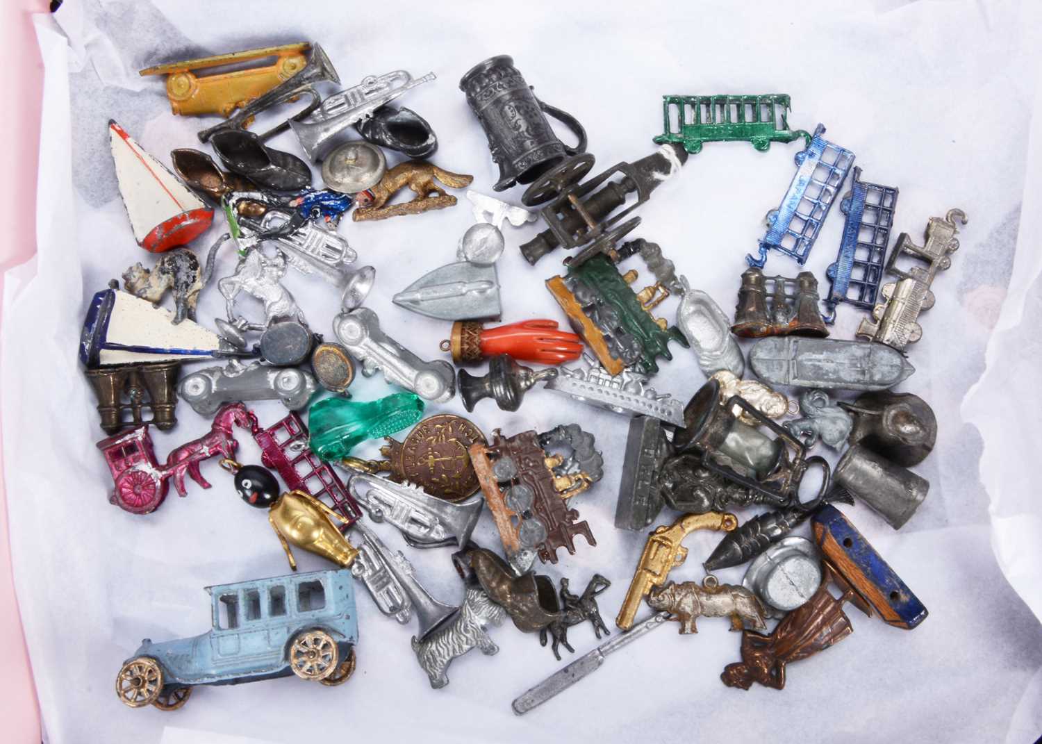 Lot 178 - Charms and cracker toys