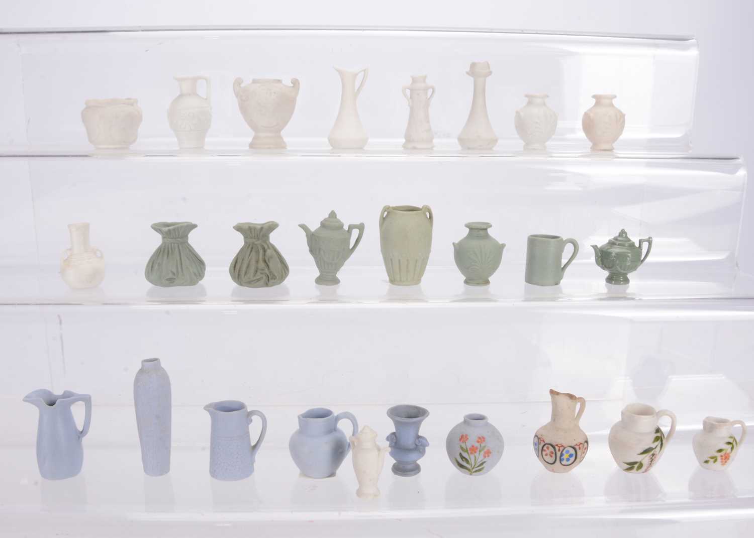 Lot 185 - German bisque dolls’ house vessels