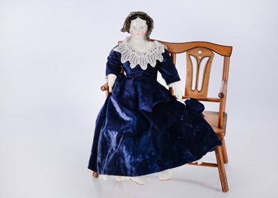 Lot 212 - An 19th century china shoulder-head doll