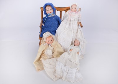Lot 213 - A small bisque headed baby doll with solerin face