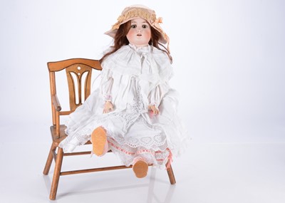 Lot 221 - A German bisque headed child doll marked Germany 14