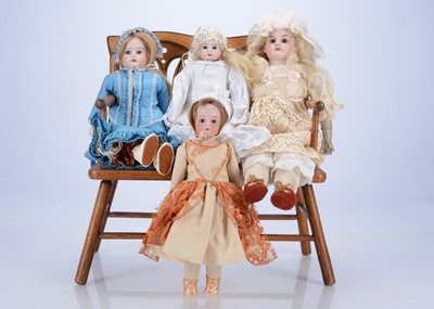 Lot 239 - Four German bisque shoulder-head lady doll