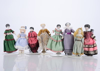 Lot 253 - Eight German bisque and china shoulder-head dolls’ house dolls