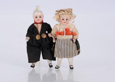 Lot 267 - Two all bisque dolls’ house dolls