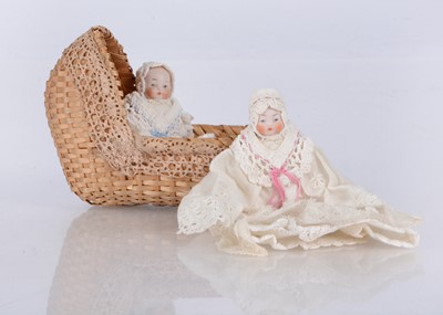 Lot 268 - A pair of pink tinted all-bisque ‘candy’ babies