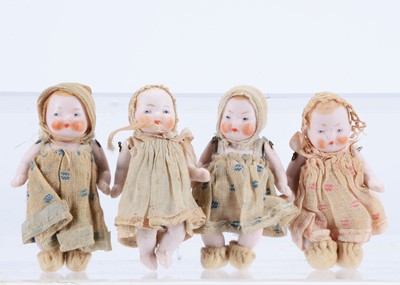 Lot 270 - Four pink tinted all-bisque ‘candy’ babies
