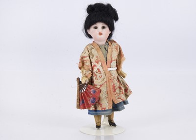 Lot 271 - A small Recknagel Asian DEP child doll