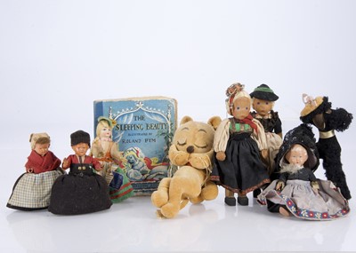 Lot 279 - Two 1920s wooden jointed dolls in national costume