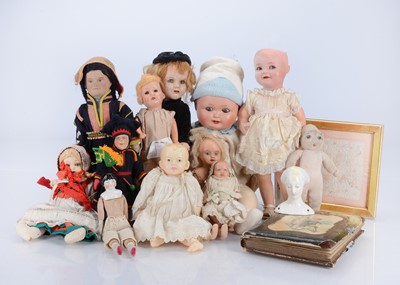 Lot 294 - A collection of various dolls including a 1055 HW composition doll