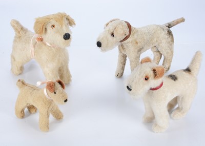 Lot 301 - Four British soft toy dogs
