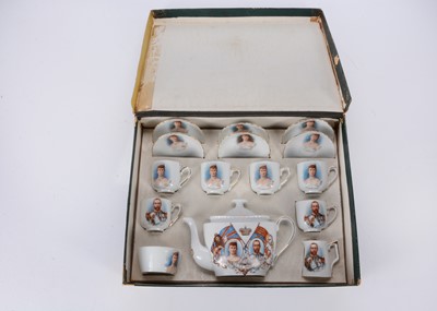 Lot 404 - A doll’s or child’s George V and Queen Mary continental tea set