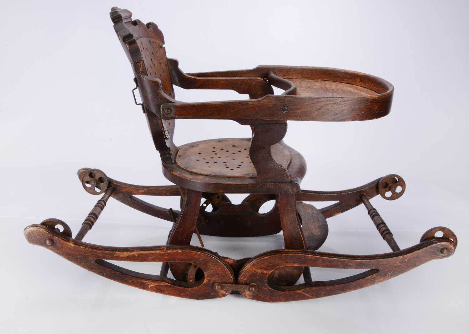 Lot 411 - An Edwardian collapsable high chair rocker,