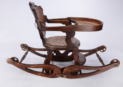 Lot 411 - An Edwardian collapsable high chair rocker