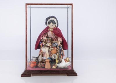 Lot 432 - An early 20th century German pegged wooden pedlar doll
