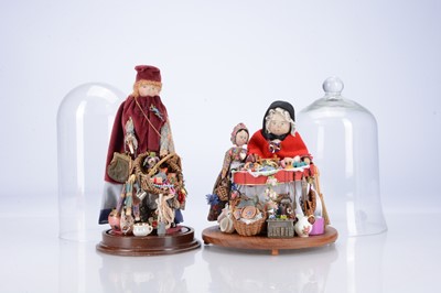Lot 436 - Two German pegged wooden pedlar dolls