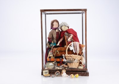 Lot 438 - An early 20th century German pegged wooden pedlar doll
