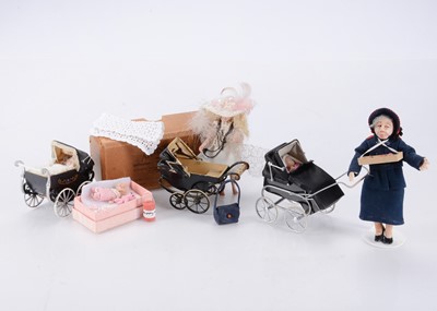 Lot 448 - Two dolls’ house modern miniaturist dolls
