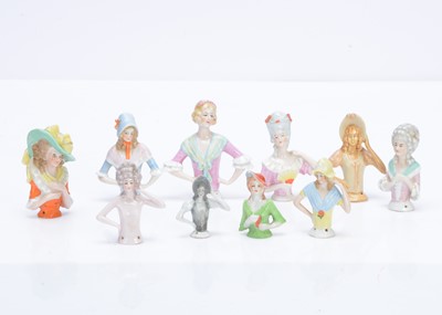 Lot 492 - Nine German pin cushion/half dolls