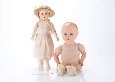 Lot 495 - Two 1940s Unica Liberation of Belgium, child dolls