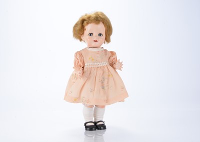 Lot 602 - A 1950s Pedigree hard plastic walking doll