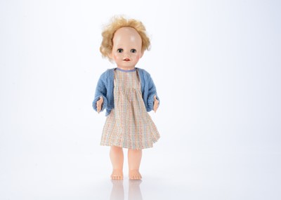 Lot 603 - A 1950s hard plastic walking doll