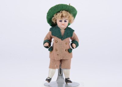 Lot 638 - A German all bisque dolls’ house boy doll