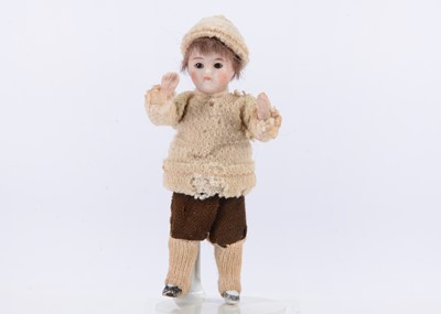 Lot 643 - A German all-bisque dolls’ house boy doll