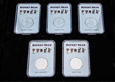 Lot 211 - A 2020 Isle of Man 'Rupert Bear' Silver 50 pence collection and a coin and stamp set