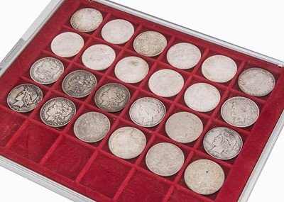 Lot 216 - A collection of 24  US Silver Dollars