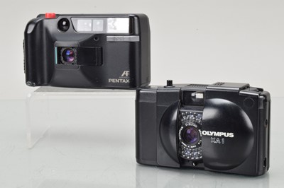 Lot 244 - Two Compact Cameras