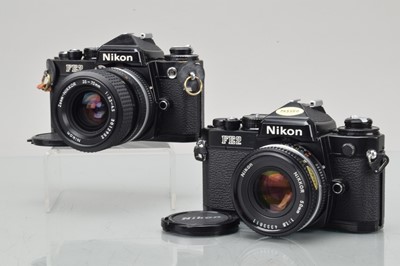 Lot 297 - Two Nikon FE2 SLR Cameras
