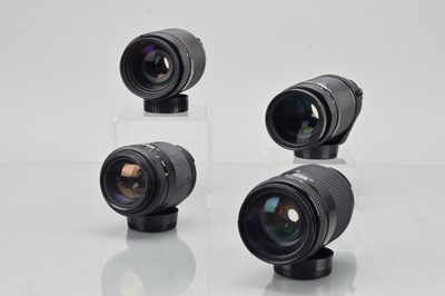 Lot 318 - Four Nikon AF Nikkor Lenses