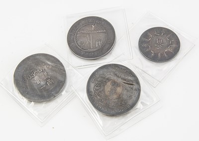 Lot 246 - A collection of four Chinese silver coins