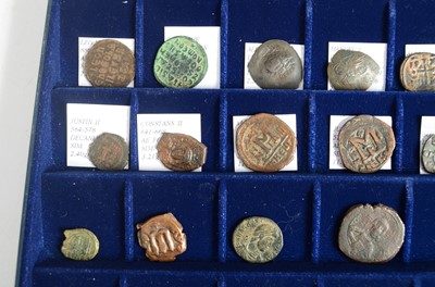 Lot 10 - A collection of twenty one Roman copper coins