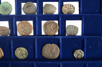 Lot 10 - A collection of twenty one Roman copper coins