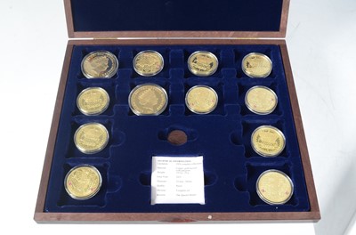 Lot 24 - A collection of Gold plated coins and medallions