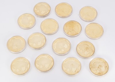 Lot 334 - A collection of 15 gold coloured coins