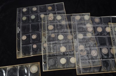 Lot 95 - A collection of British silver Shillings sixpences and threepence coins