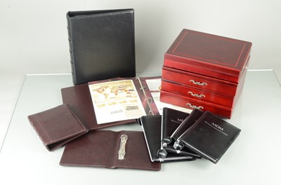 Lot 110 - A collection of empty coin collection cases and certificate folders