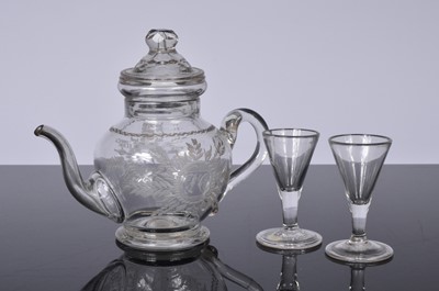 Lot 4 - A Georgian period glass teapot and two small drinking glasses