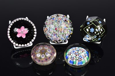 Lot 17 - A collection of five assorted glass paperweights