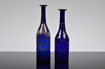 Lot 26 - A pair of Bristol blue glass decanters